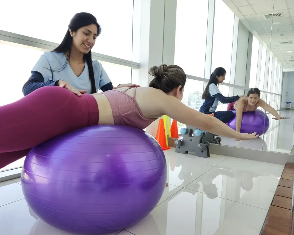 fisioterapia en gimnasio espondilolistesis